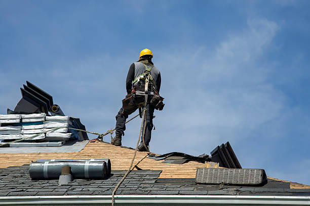Professional Roofing technician working in Moulton, IA